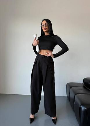 Жіночі брюки палаццо з акцентною талією