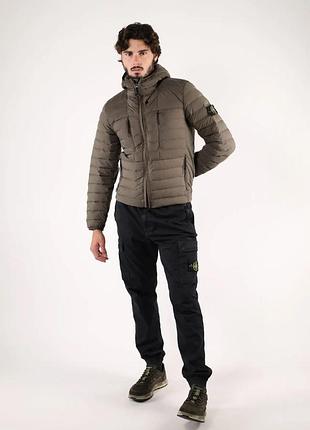 Stone island  куртка кольору хакі з капюшоном. якісна, дорога річ.