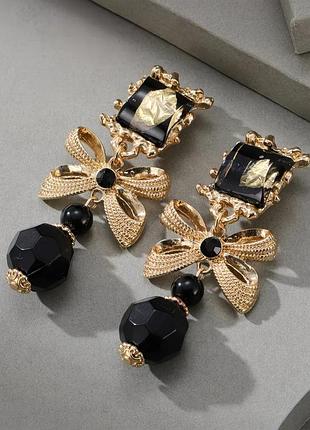 Серьги-клипсы “black orchid” массивные золотистые стиль винтаж бант