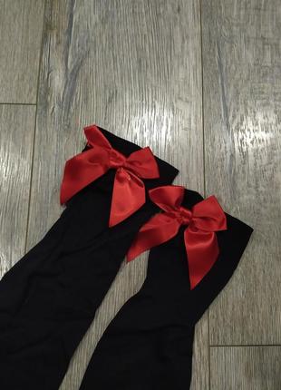 Черные плотные чулки с красным бантом4 фото
