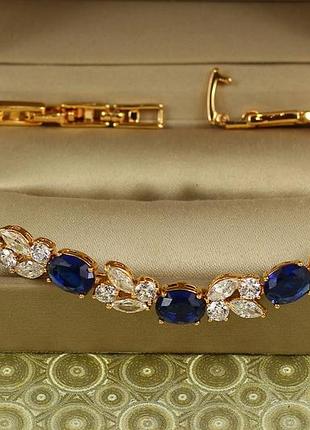 Браслет xuping jewelry звездопад с синими камнями 17,5 см золотистый