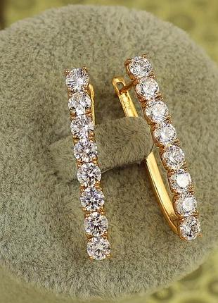 Сережки xuping jewelry доріжка з крупними білими каменями 3,3 см золотисті