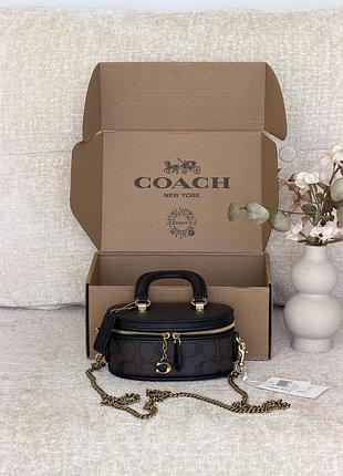 Жіноча сумка coach trail crossbody 17 шоколадний через плечі коуч