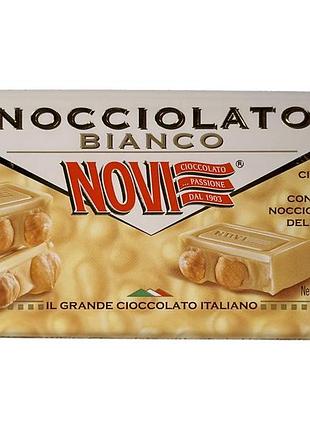 Шоколад белый novi с фундуком e cioccolato bianco con nocciole intere, 130 г