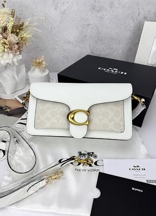 Coach tabby white logo (плями)