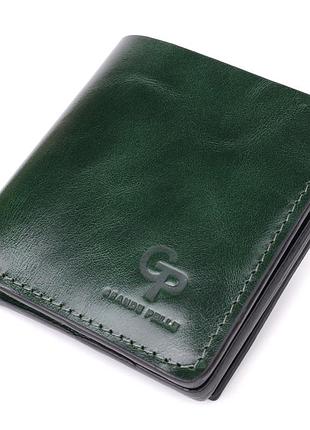 Компактный кошелек в два сложения из натуральной гладкой кожи grande pelle 22946 зеленый