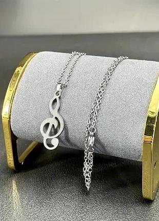 Сріблястий ланцюжок з підвіскою скрипкового ключа