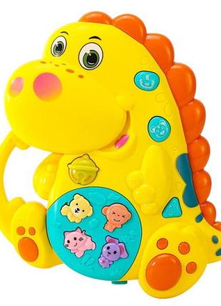 Музична розвиваюча іграшка 15см, limo toy. дино помаранч, муз., звук(укр), світло, бат., в кор. 16*19,5*5,5см