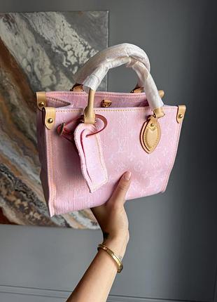 Louis vuitton onthego pm in pink monogram denim