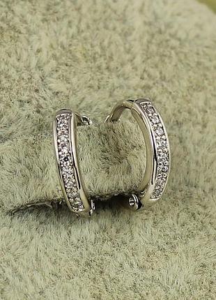 Серьги xuping jewelry кольца с камешками 1,1 см серебристые