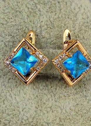 Серьги xuping jewelry ромбик с голубым камнем 1,4 см золотистые