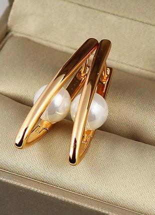 Сережки xuping jewelry стрілв з перлиною в середині 3.1 см золотисті