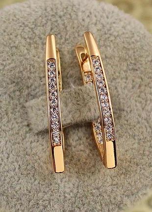 Сережки xuping jewelry дорожки стрелы с камнями с внешней и внутренней стороны 3 см золотисті