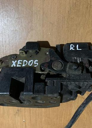 Замок дверей задній лівий mazda xedos 6
