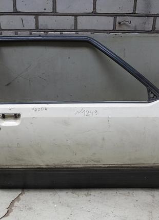 Двері права (3х-дв) mazda 323 bd (80-85)