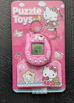 Рожевий тамагочі хеллоу киті маленька ігрова ретроприставка hello kitty anime tamagotchi pink віртуальний вихованець піксельні ігри