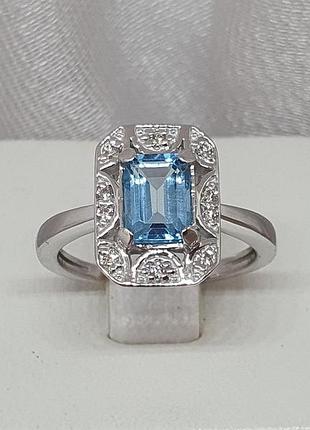 Золотое кольцо с бриллиантами и топазом. б11057/1 17