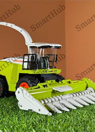 Комбайн на пульті управління claas. комбайн трактор на радіокеруванні. трактор на радіоуправлінні