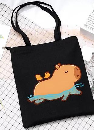 Шоппер капібара пливе