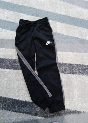 Штани з плащьовки nike