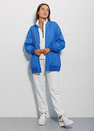 Жіноча вітровка блакитна l-xl