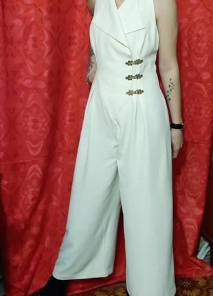 Брючный комбинезон масляного цвета на 3-х металл.застежках.