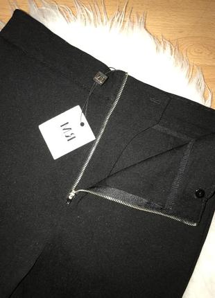 🌿актуальные чёрные брюки с рюшами штаны в обтяжку с воланами3 фото