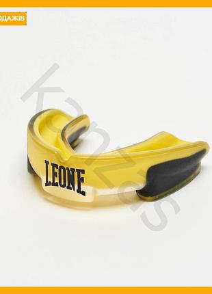 Капа боксерская leone термопластик желтая одночелюстная для защиты зубов в контактных видах спорта.