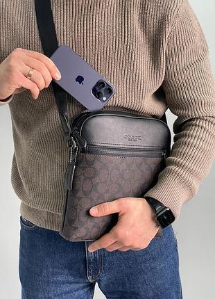 Сумка coach houston flight bag in signature canvas brown