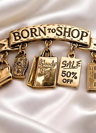 Брошка born to shop з підвісками золота стильна прикраса шопінг fashion