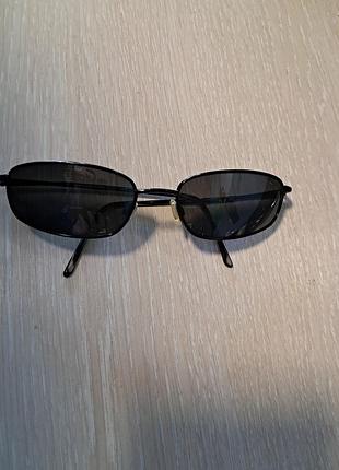 Сонцезахисні окуляри — модель maui jim mj-115-02 south shore з чорною металевою оправою та поляризаційними лінзами.