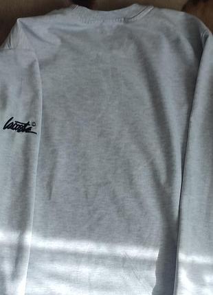 Белая футболка lacoste