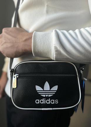 Сумка через плече adidas ac mini airl у 3-ох кольорах: чорний, зелений, синій.