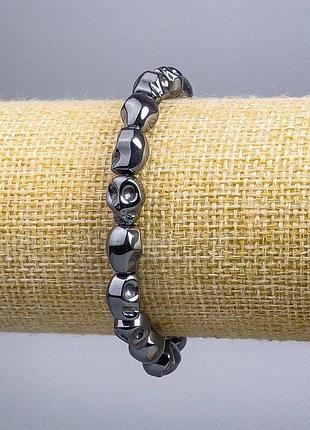 Браслет гематит череп d-8х10х7,5мм+- l-18см (стрейч)