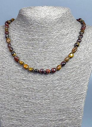 Ожерелье тигровое, бычье, соколиный глаз галтовка d-9х7мм+- l-46см +-