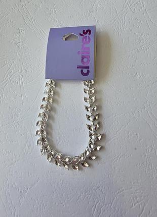 Нарядный браслет claire's с кристаллами в виде листочков.