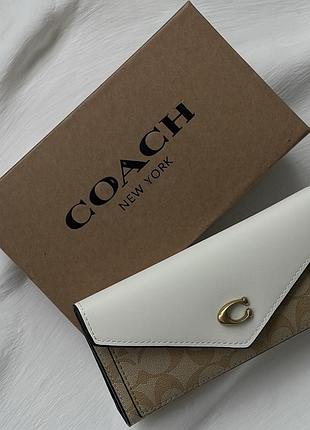 Жіночий місткий гаманець на кнопці бежевий coach довге портмоне із відділами для карток в фірмовому упакуванні