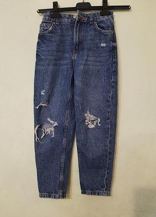 Джинсы на девочку 134 г.