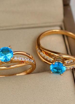 Кольцо xuping jewelry волны с голубым камнем р 16 золотистое love-shopping