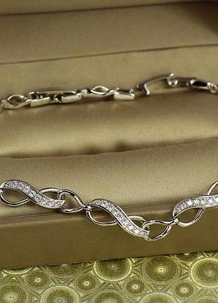 Браслет xuping jewelry восьмерки с камешками 17 см 5 мм серебристый love-shopping