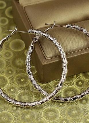Серьги кольца xuping jewelry со спиральным рисунком 4 см серебристые love-shopping