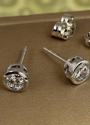 Сережки гвоздики xuping jewelry з каменем в обідку 6 мм сріблясті love-shopping