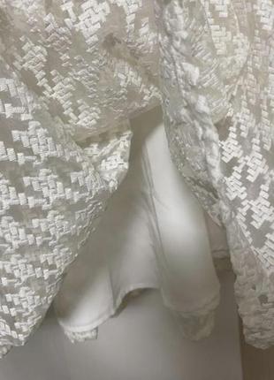 Белая пышная юбка из вышитой органзы с подьюпником4 фото