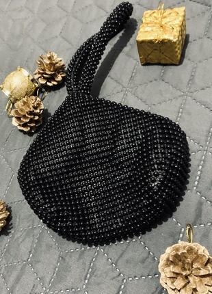 Сумочка-клатч из бусин черного цвета