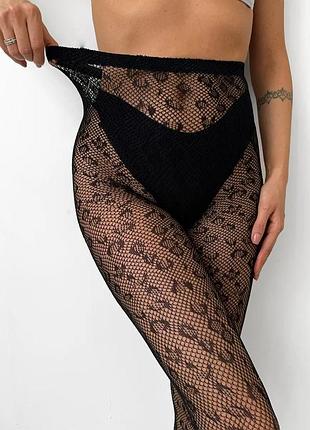 Колготки в сіточку з леопардовим візерунком чорні one size 8063 нейлонові колготи чорного кольору принт