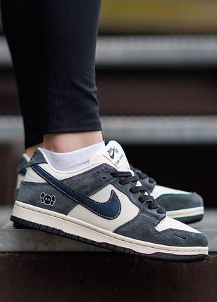Nike sb dunk low x kaws white blue 8