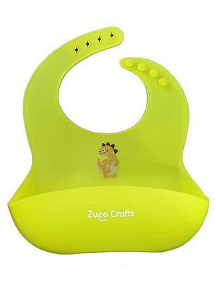 Слюнявчик силиконовый zupo crafts dino желтый