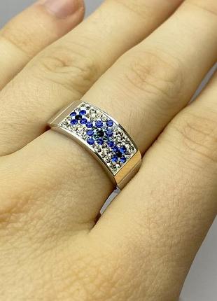 Кольцо комбинированное серебряное с золотыми накладками и кристаллами swarovski