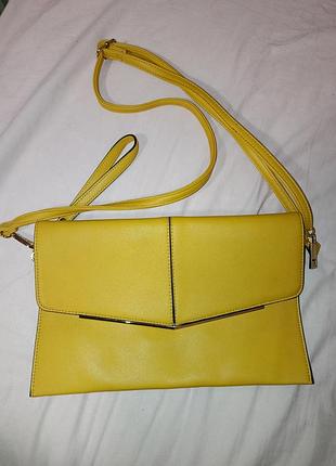 Нова акцентна сумка-клатч з довгою ручкою