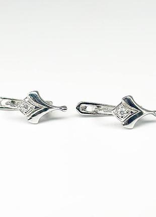 Серебряные серьги родированные с английской застежкой со вставкой фианит